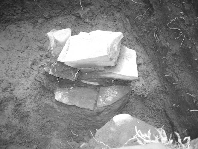 Stones from the Flint House archaeological excavation in porch square K2